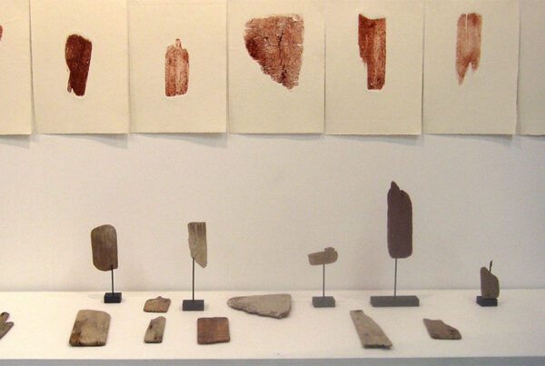 Installation of found wooden objects, unique state prints on paper, wire and charcoal, approximately 70 x 200 x 50 cm, 2013.